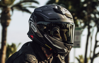 Snell-certified motorcycle helmet — high-speed impact and penetration tested