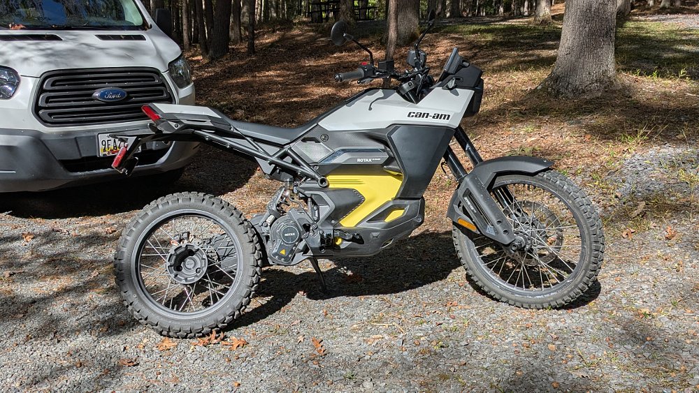 photo of the Can-Am Origin parked at a camp site with the camper van in the background