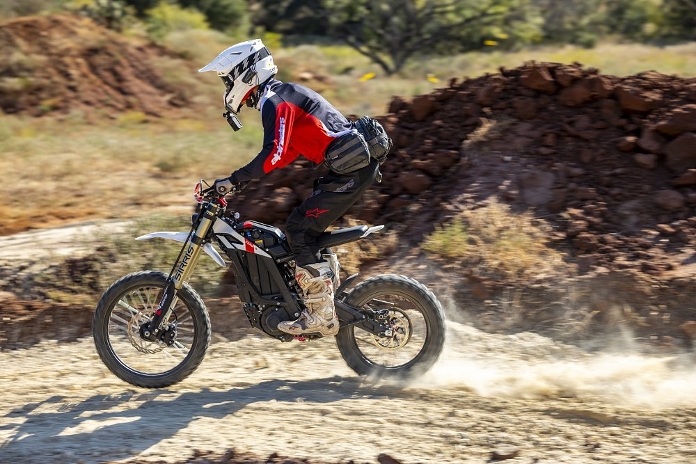 rider standing up while riding the XB, somewhat hunched over