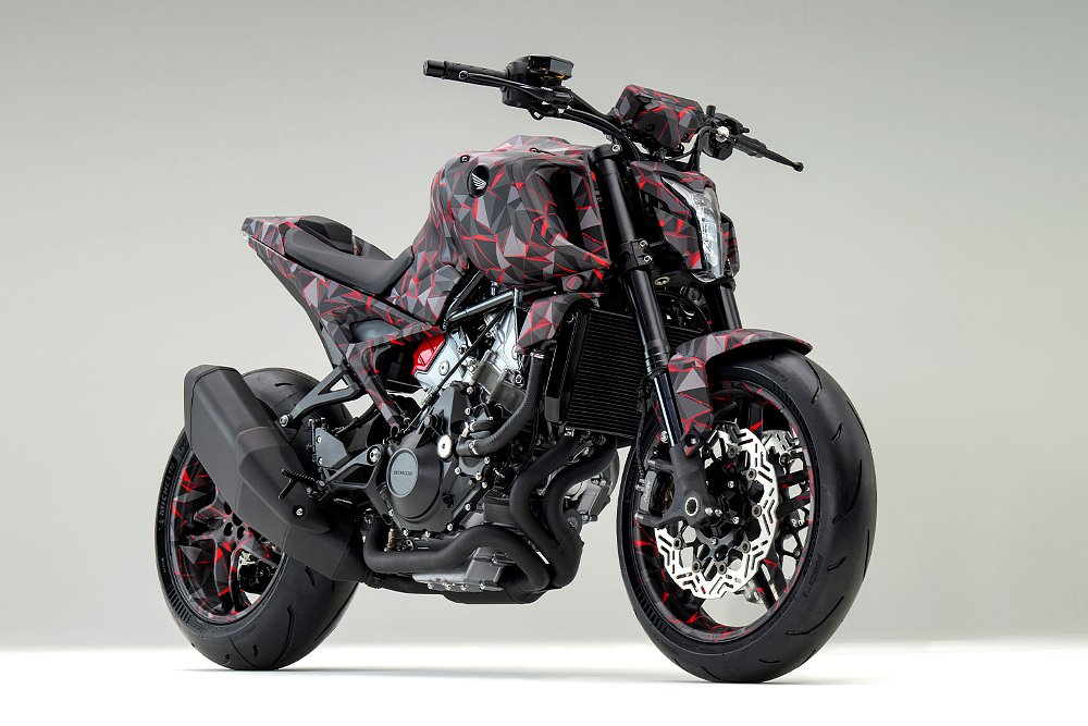 A front-right view of the Honda V3R 900 E-Compressor prototype against a white background.