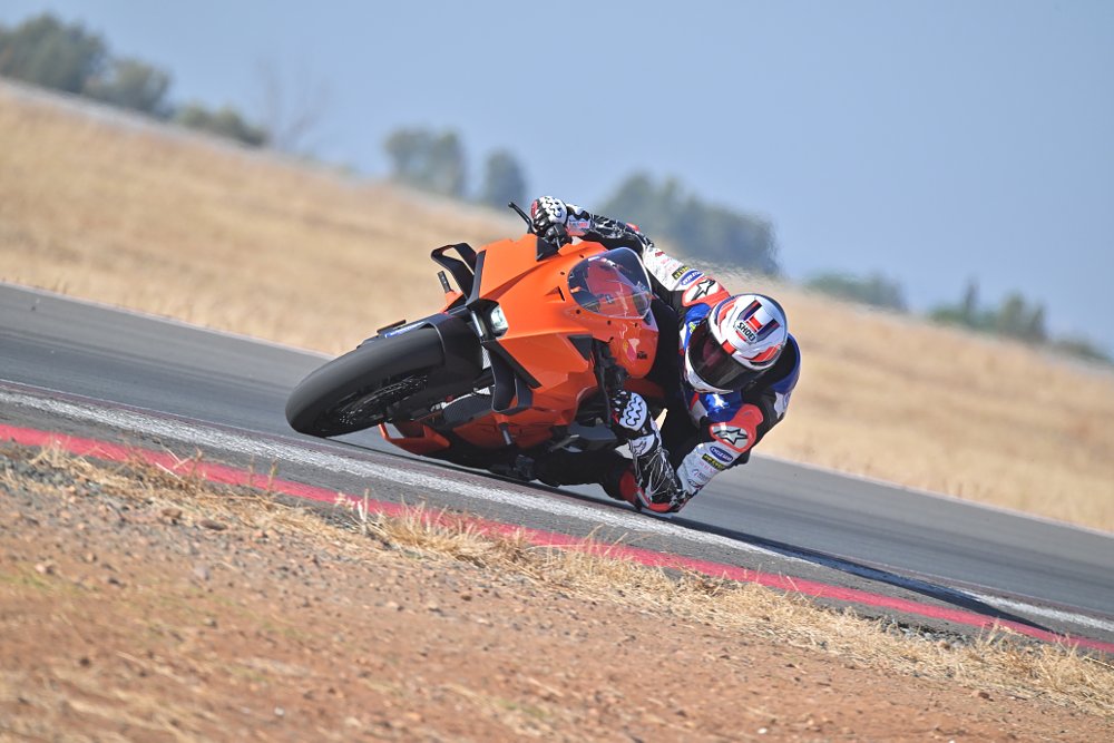 2026 KTM 990 RC R riding on a race track.