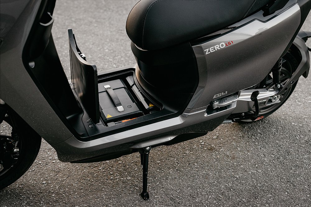 A close-up of the removable batteries housed in the floorboards of the Zero LS1.