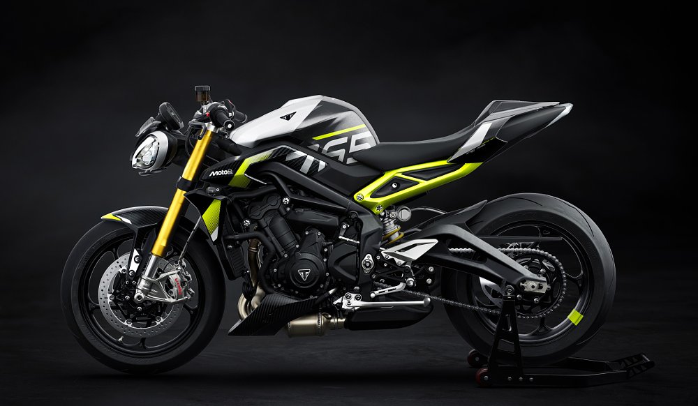 studio view of the Street Triple Moto2 from left side, silver with neon yellow-green highlights