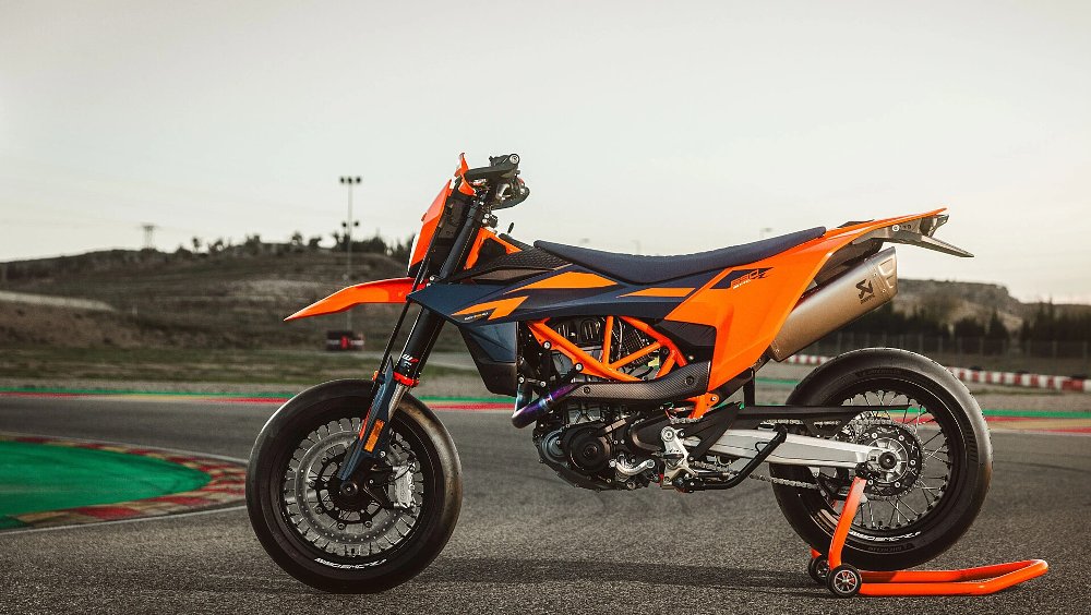 side view of the KTM 690 SMC R parked at the race track