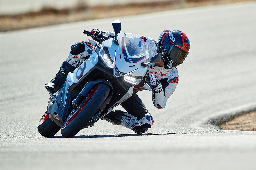 Dustin riding his Aprilia RS 457 on the race track