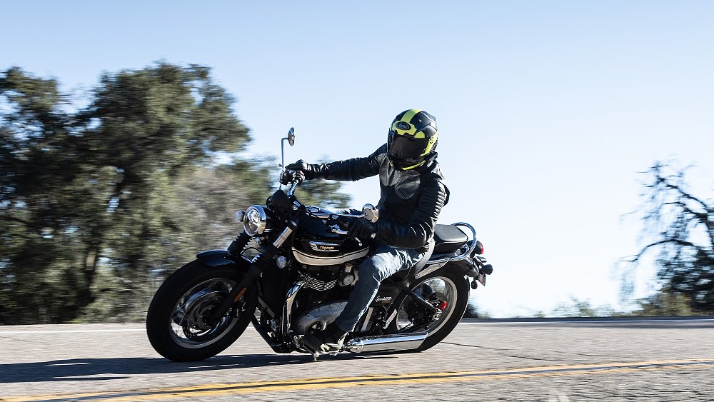 Dustin rides the Bonneville Speedmaster through a sweeping corner.