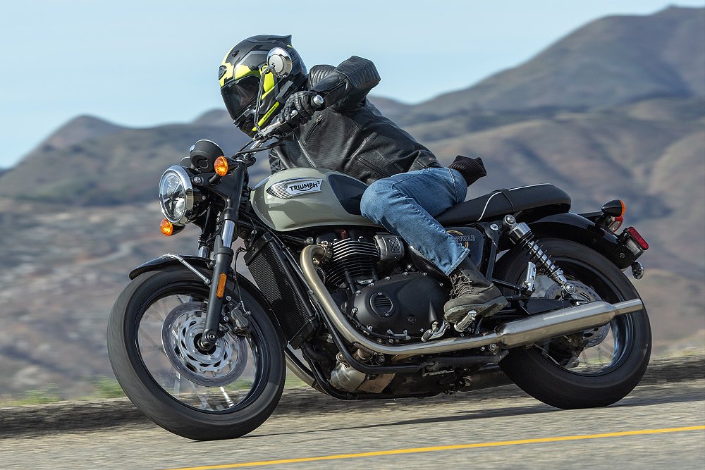 Dustin rides the T100 along a mountain road.