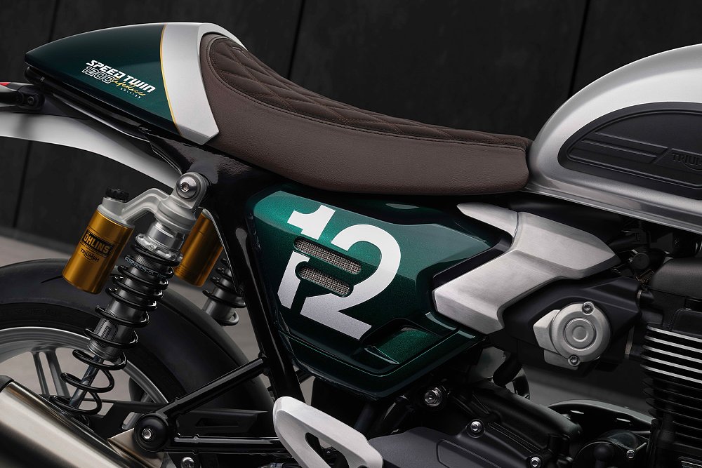 A close-up of the Speed Twin 1200 Cafe Racer's side panel and seat.