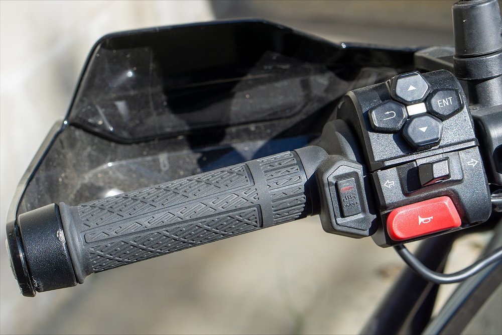 A close-up of CFMOTO's accessory heated grips.