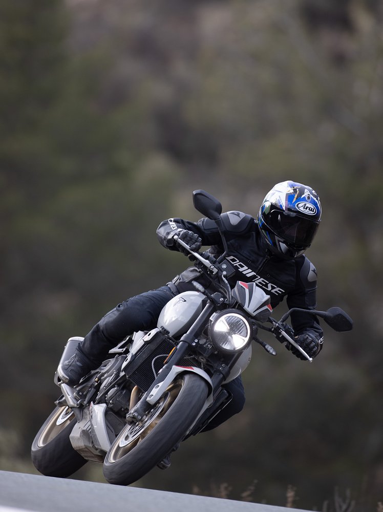 view of the rider on a Trident 800 coming straight toward the camera