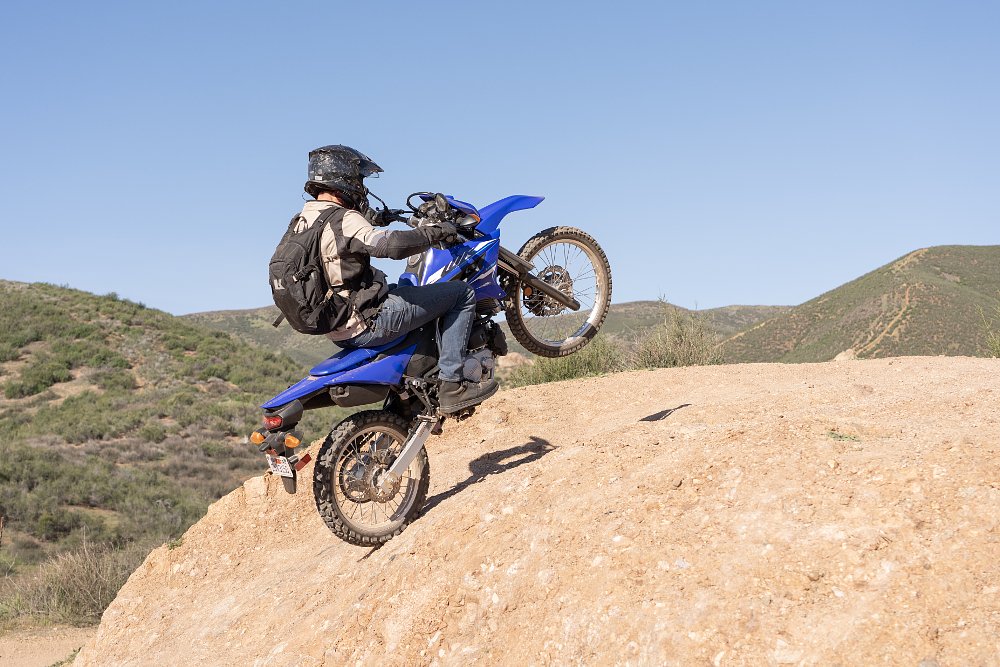 2026 Yamaha WR125R climbing a rock face