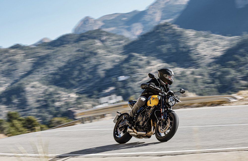 view of rider on a curve in the mountain roads of Spain