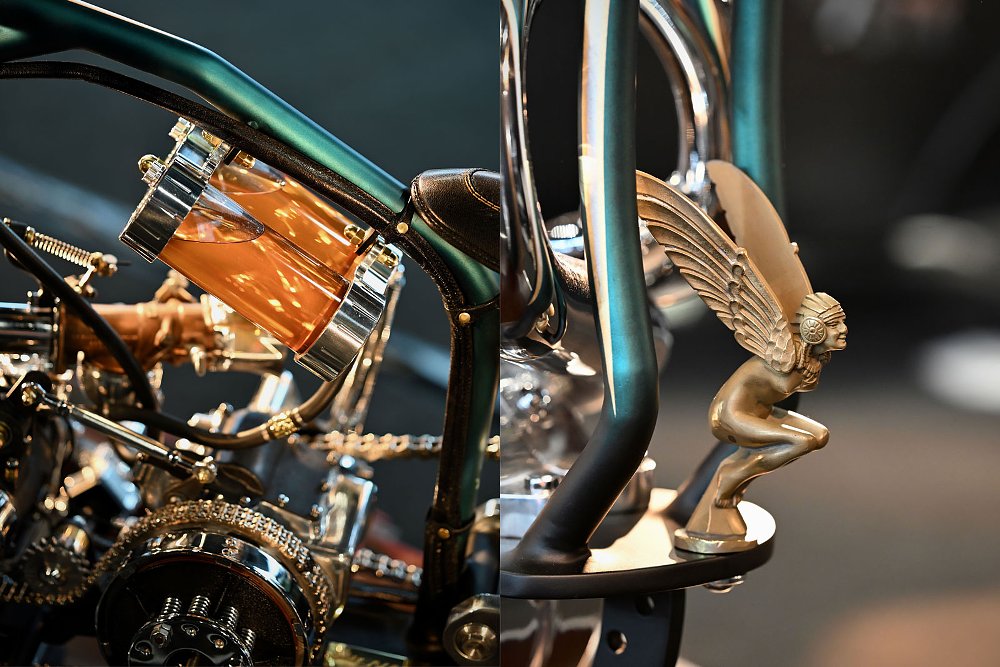 close view of a gold Nike goddess statue on the front of the motorcycle