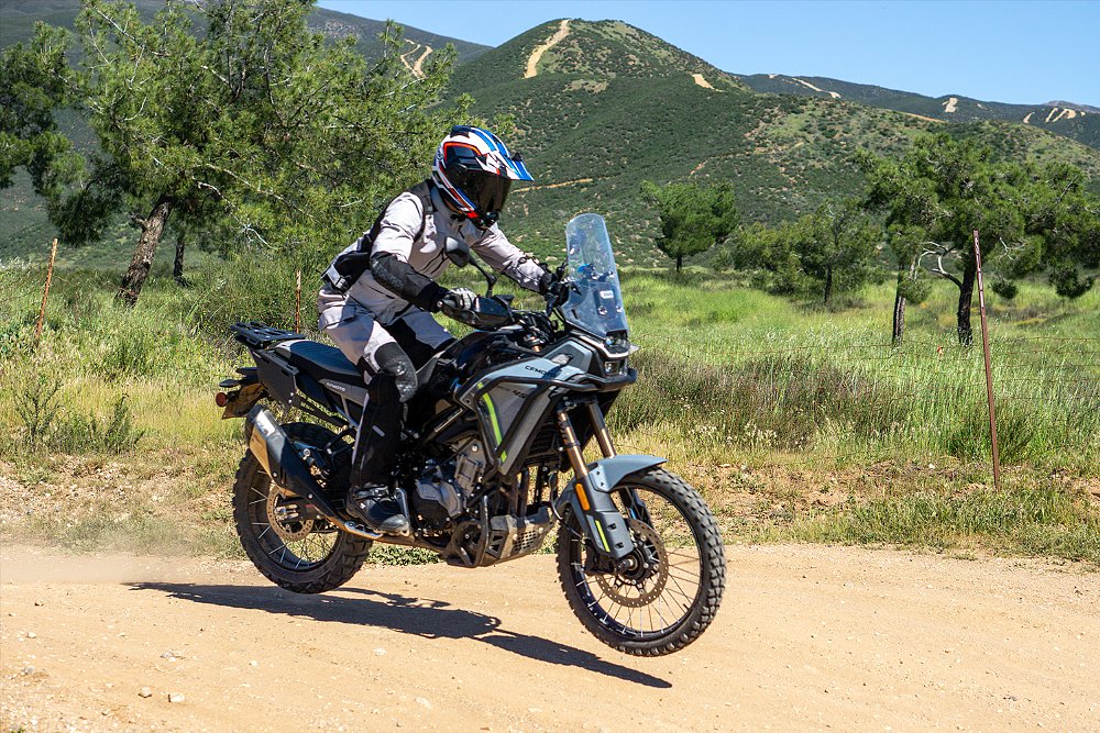 Dustin catches an embarrassingly minimal amount of air while launching the Ibex 450 off a jump.