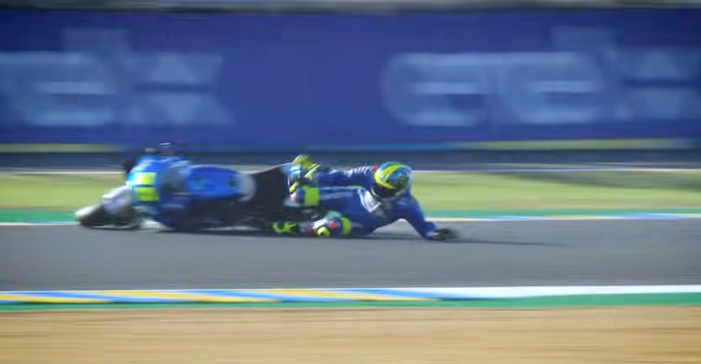 Suzuki Ecstar MotoGP rider Joan Mir crashes in Turn 1 at the LeMans circuit in 2020.