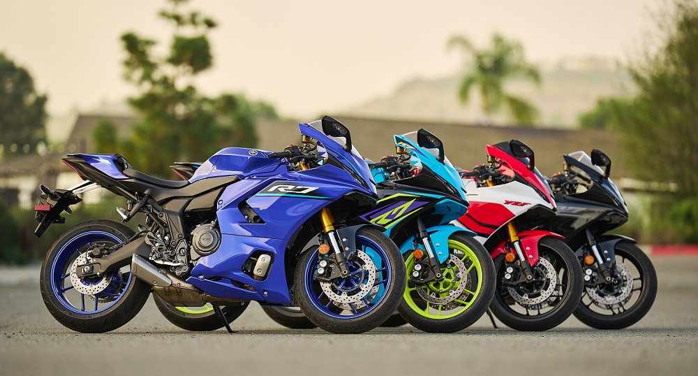 Four R7s in the four color options parked in a row