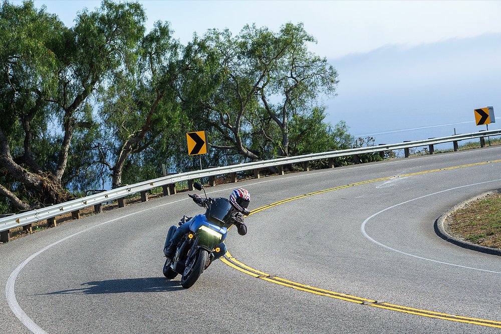 Dustin bends the Pan America ST through a hairpin curve.
