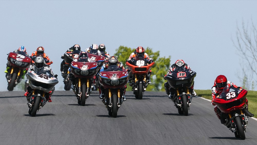King of the Baggers racers speed down a straightaway. 