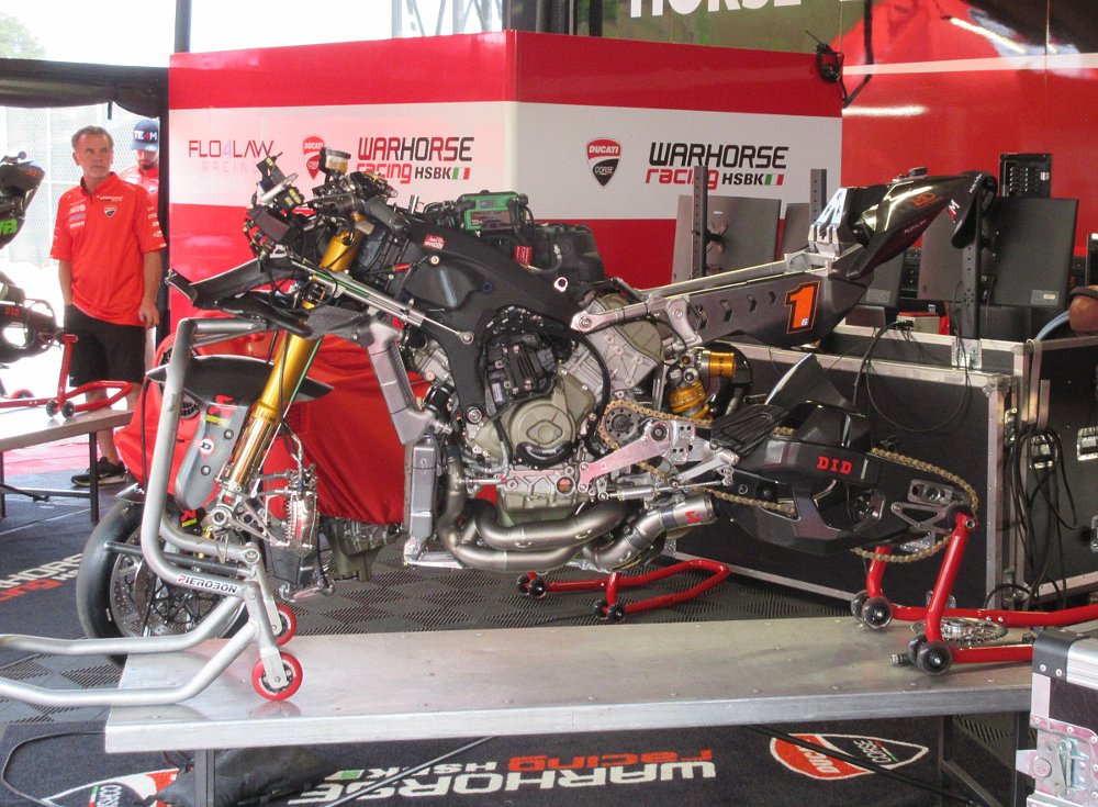 Beaubier's Ducati Superbike on the work stand in the paddock, fully stripped down to the frame and engine