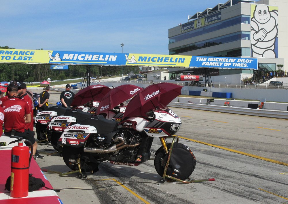 three J&P Cycles/Vance & Hines Indian race bikes lined up near the finish line at Road Atlanta, prepped for the race
