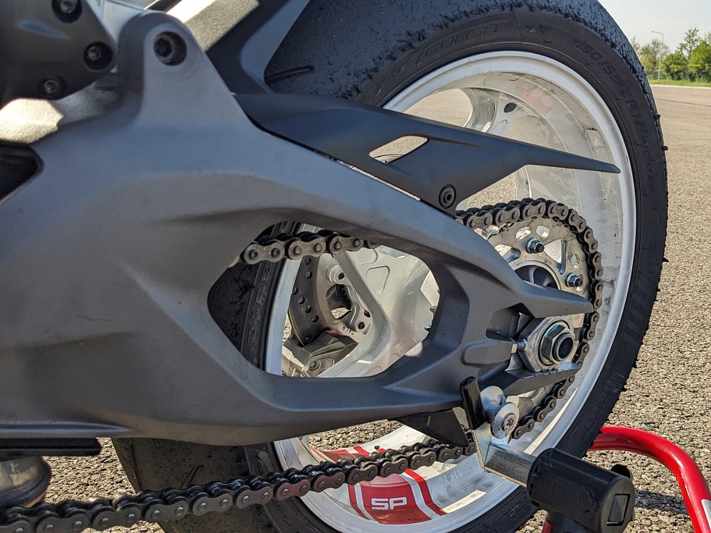 close view of rear wheel and double-sided swingarm