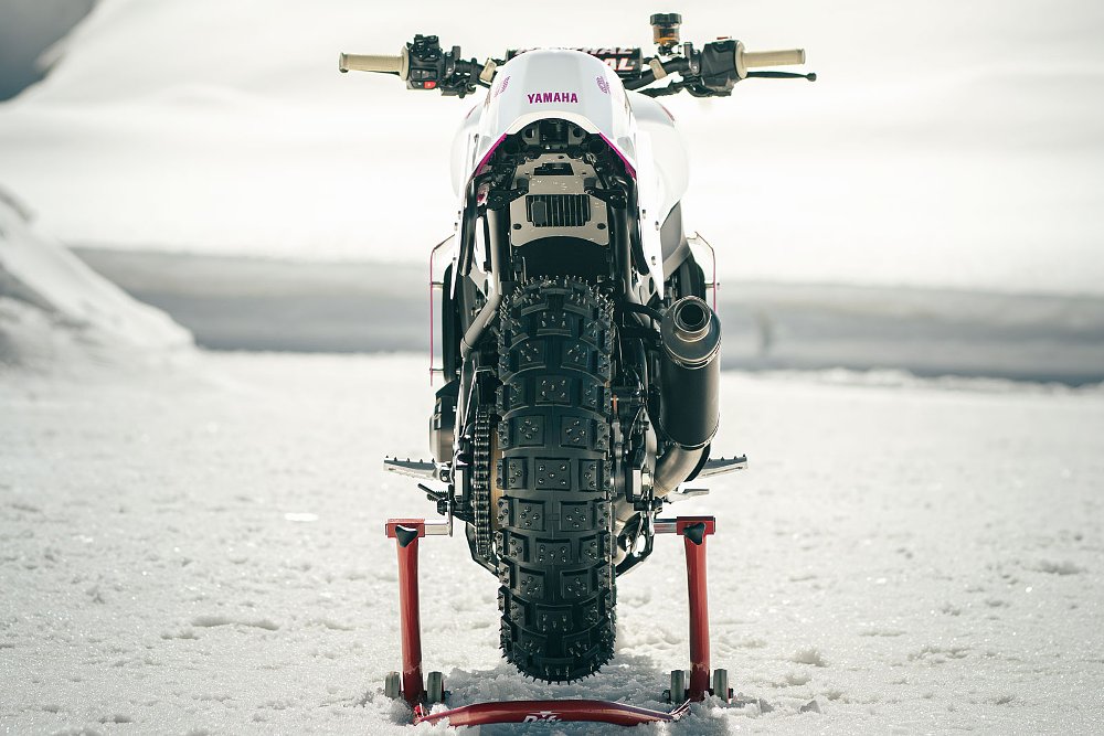 rear view of the race bike with studded rear tire