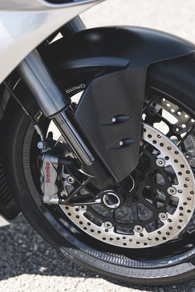 close view of the front wheel, suspension, and brakes