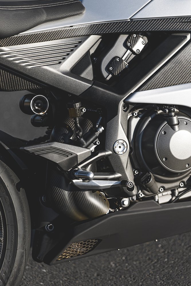 close view of the tightly packaged V-four engine in the Manx R
