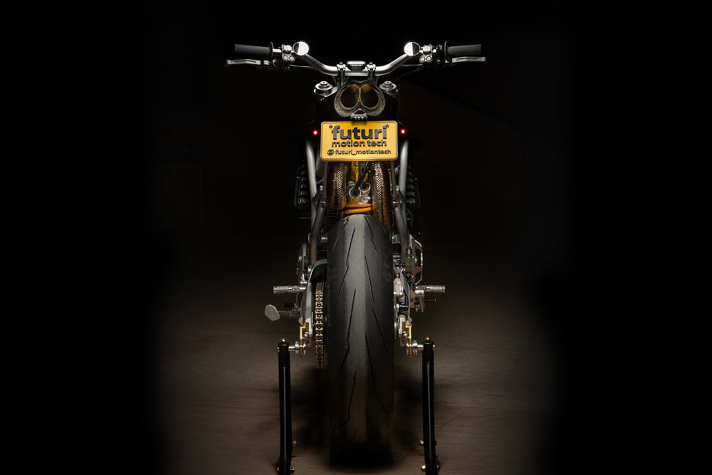 rear view of the motorcycle, with small round mirrors set inboard