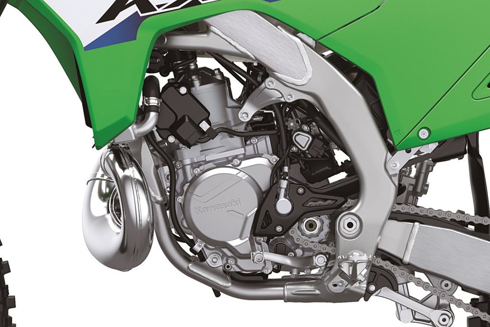 A close-up of the KX327's two-stroke engine.