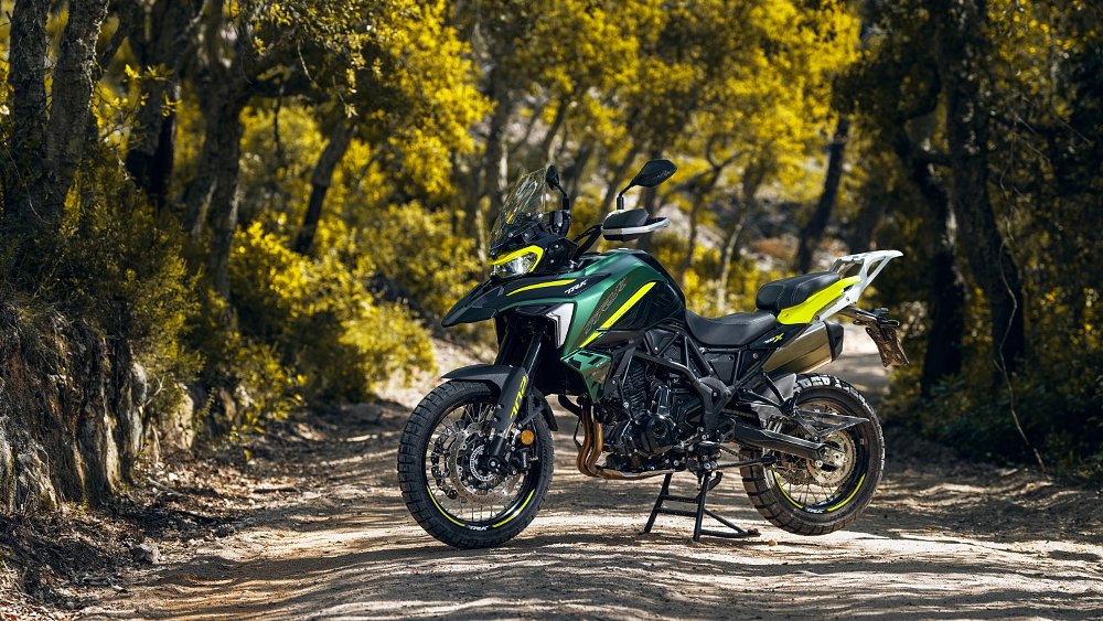 TRK 702X parked on a dirt road in the forest