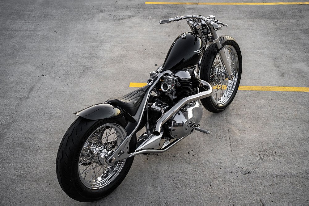 overhead view of the slender, black custom with polished frame