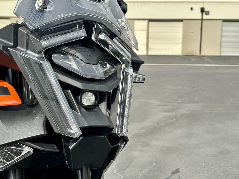 2027 KTM 1390 Super Adventure S EVO headlight detail.