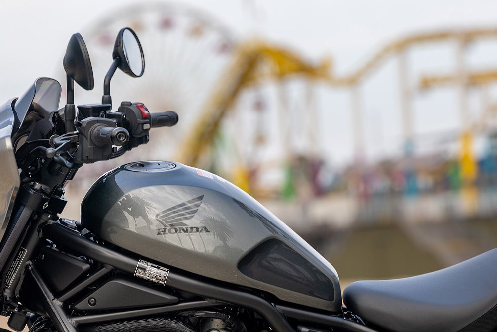 The Rebel 1100T's fuel tank photographed with the Santa Monica Pier in the background.