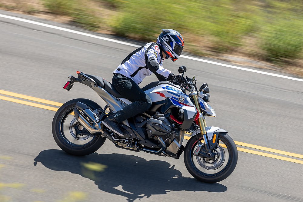 Dustin charges down a canyon road aboard the R 1300 R.