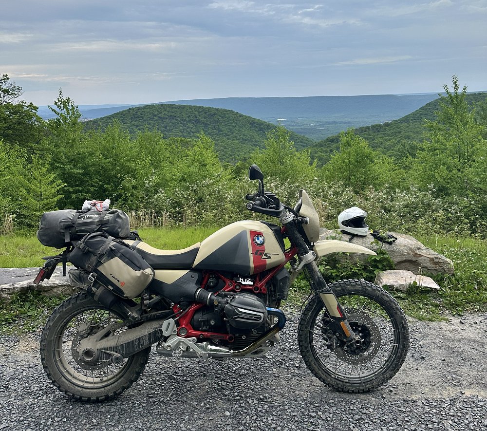 the BMW parked at a mountain overlook