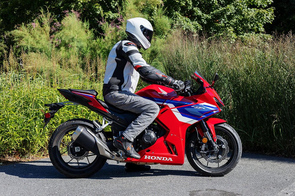 side view of rider on a stationary bike to show the relatively relaxed riding position