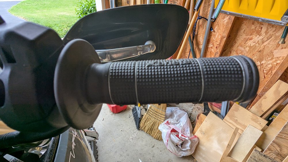 close view of safety wire on the throttle grip