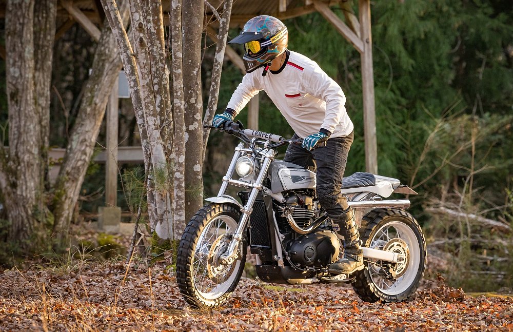 rider on the scrambler in autumn woods