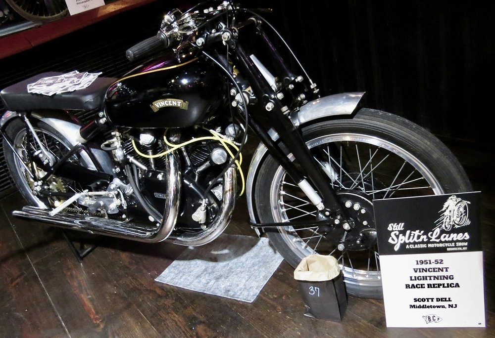 a black Vincent from the early 1950s on display at the show