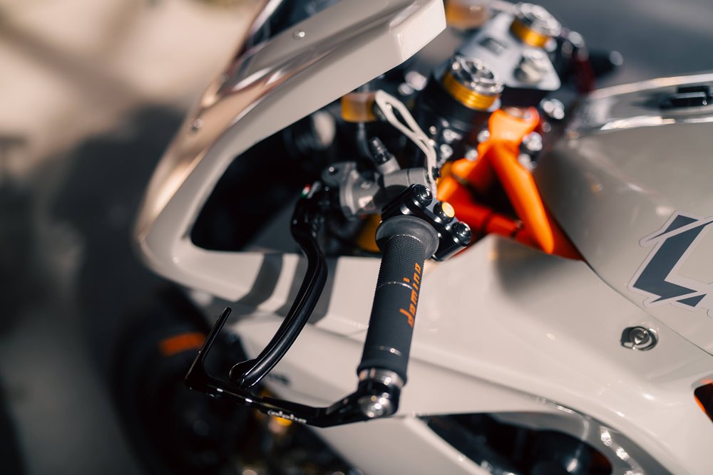 Lightfighter V3-RS left handlebar and switchgear detail.