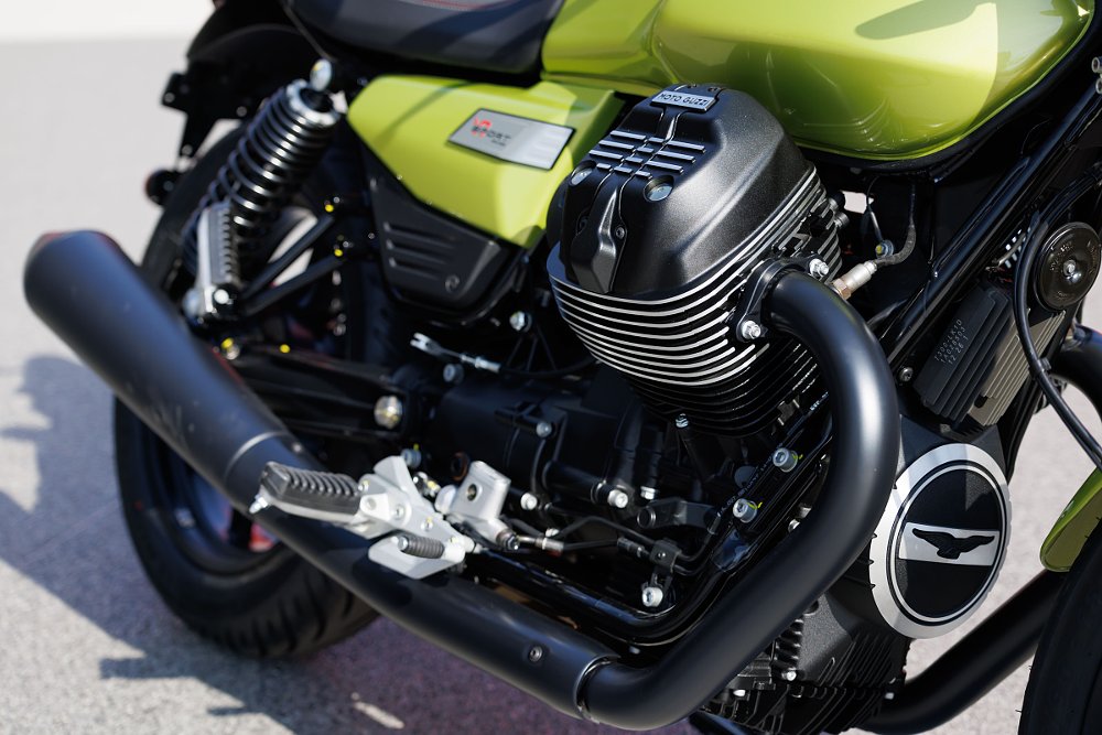 close view of blacked-out V7 Sport's V-twin engine and black exhaust
