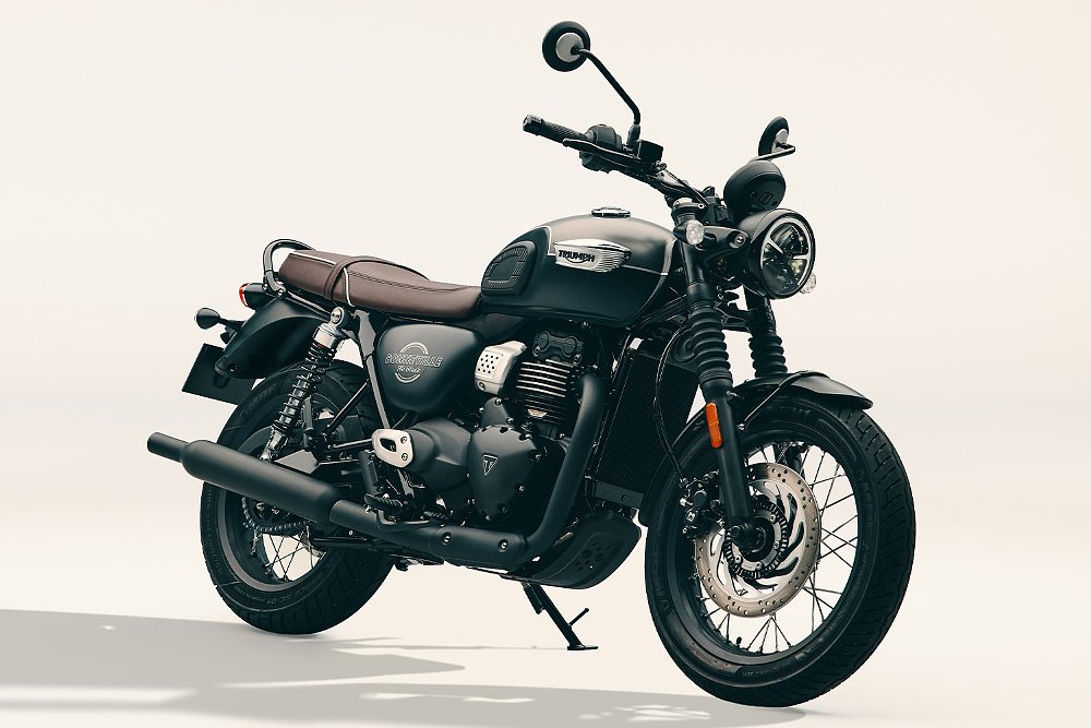 The Bonneville T40 Black staged against a beige background.