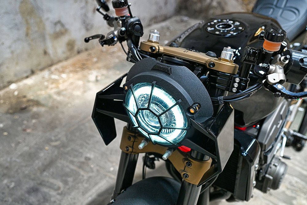 close view of the web-like headlight cover