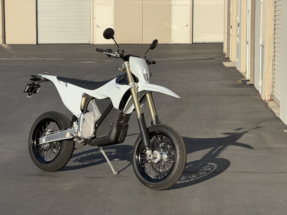 2026 Stark VARG SM parked in an industrial parking lot.