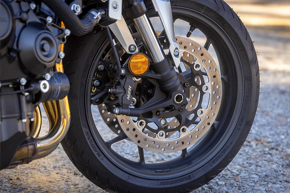 A close up of the CB1000F's front wheel.