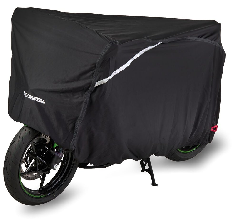 photo of a motorcycle with the black cover on it