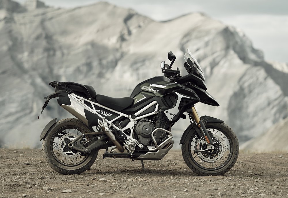 Triumph Tiger 1200 Rally Pro parked in a mountain scene