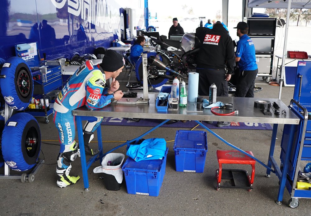Toni Elias waits for techs to prep his bike