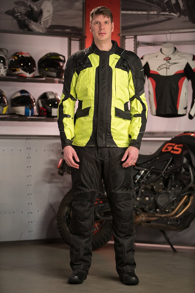 Model Wearing Tourmaster Transition 4 Jacket and Tourmaster Caliber Pants
